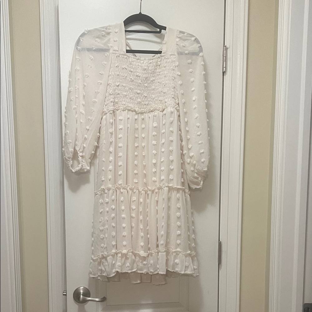 Elegant boutique Cream Dress with Textured Details